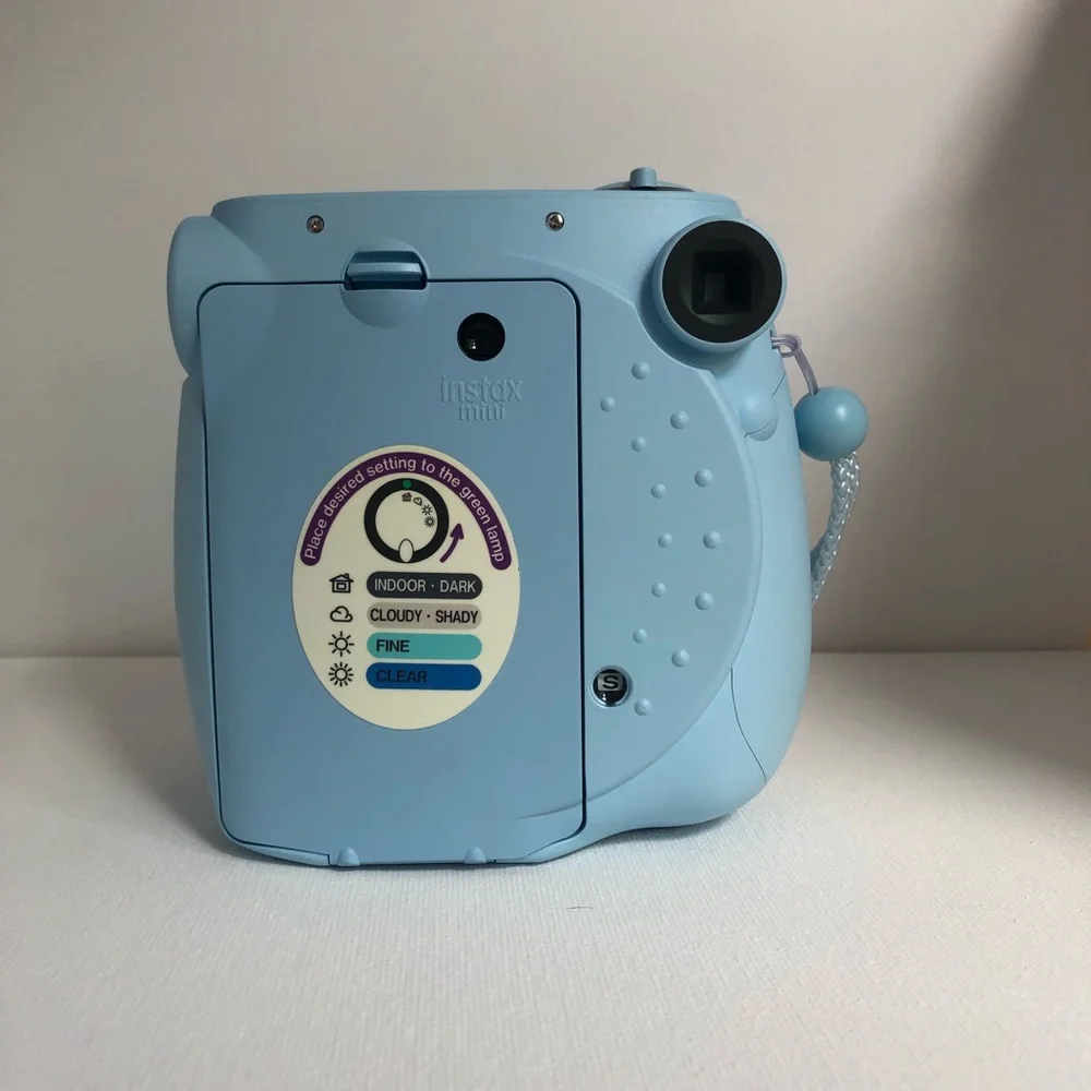 Blue instax mini 7s Polaroid camera
